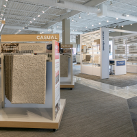 Flooring America of Oklahoma City showroom with carpet samples and design displays.